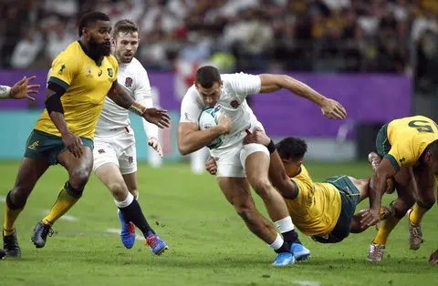 May Day as England crush Wallabies to reach semis