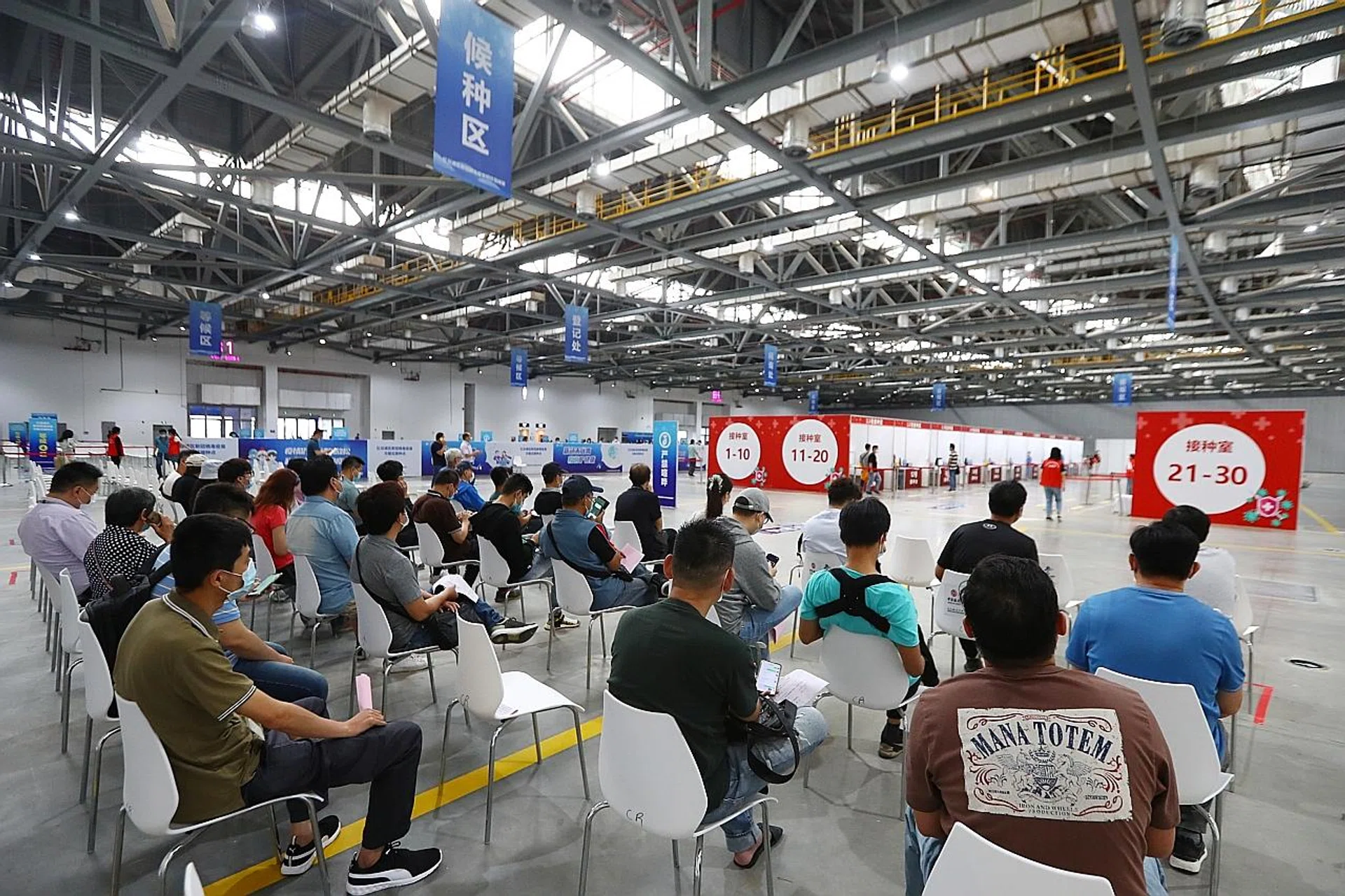 People from Taiwan waiting to be vaccinated during a session organised by the local Taiwan Affairs Office in Nanchang, Jiangxi province, China. 