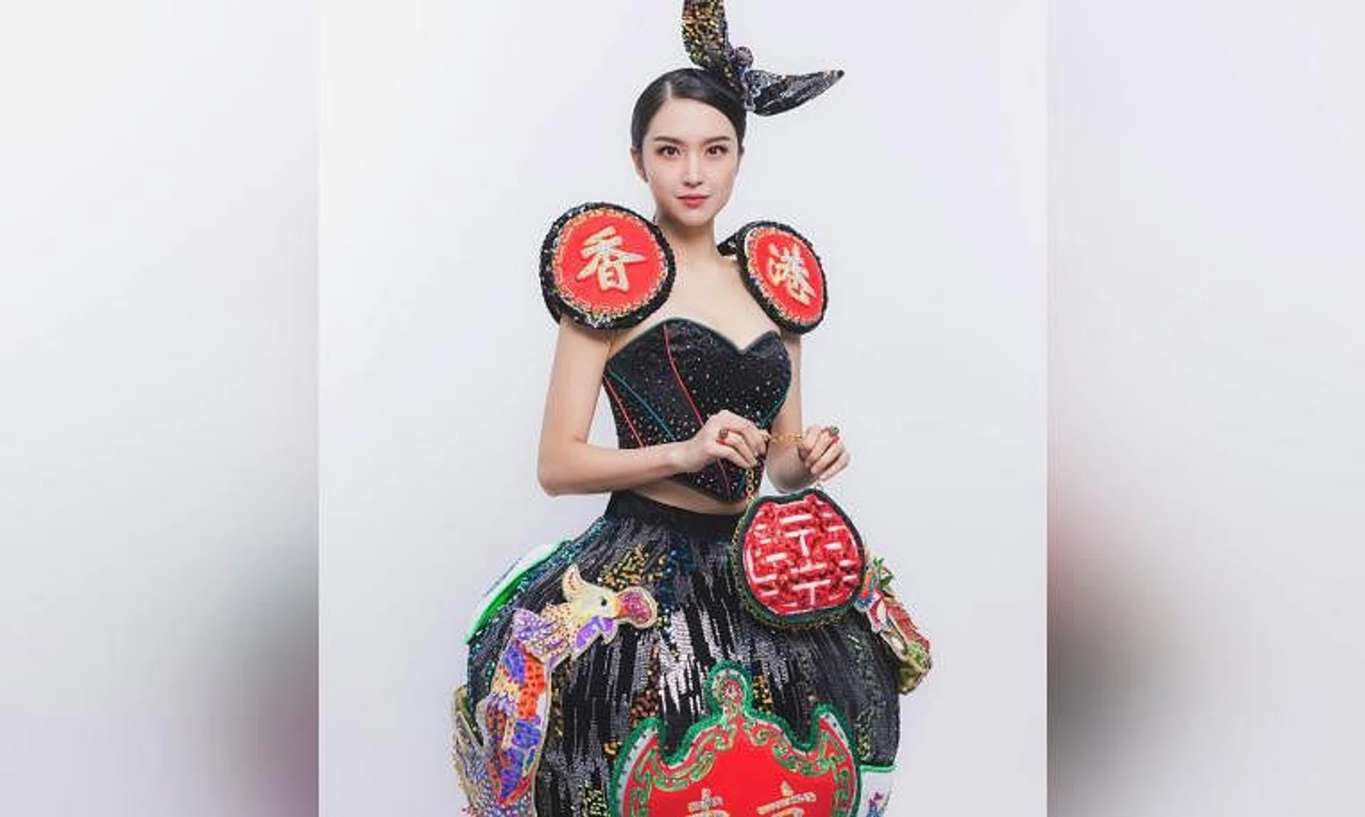 The outfit Ms Verna Leung will be wearing at the Miss International Beauty Pageant was designed by seven students from the Hong Kong Design Institute.