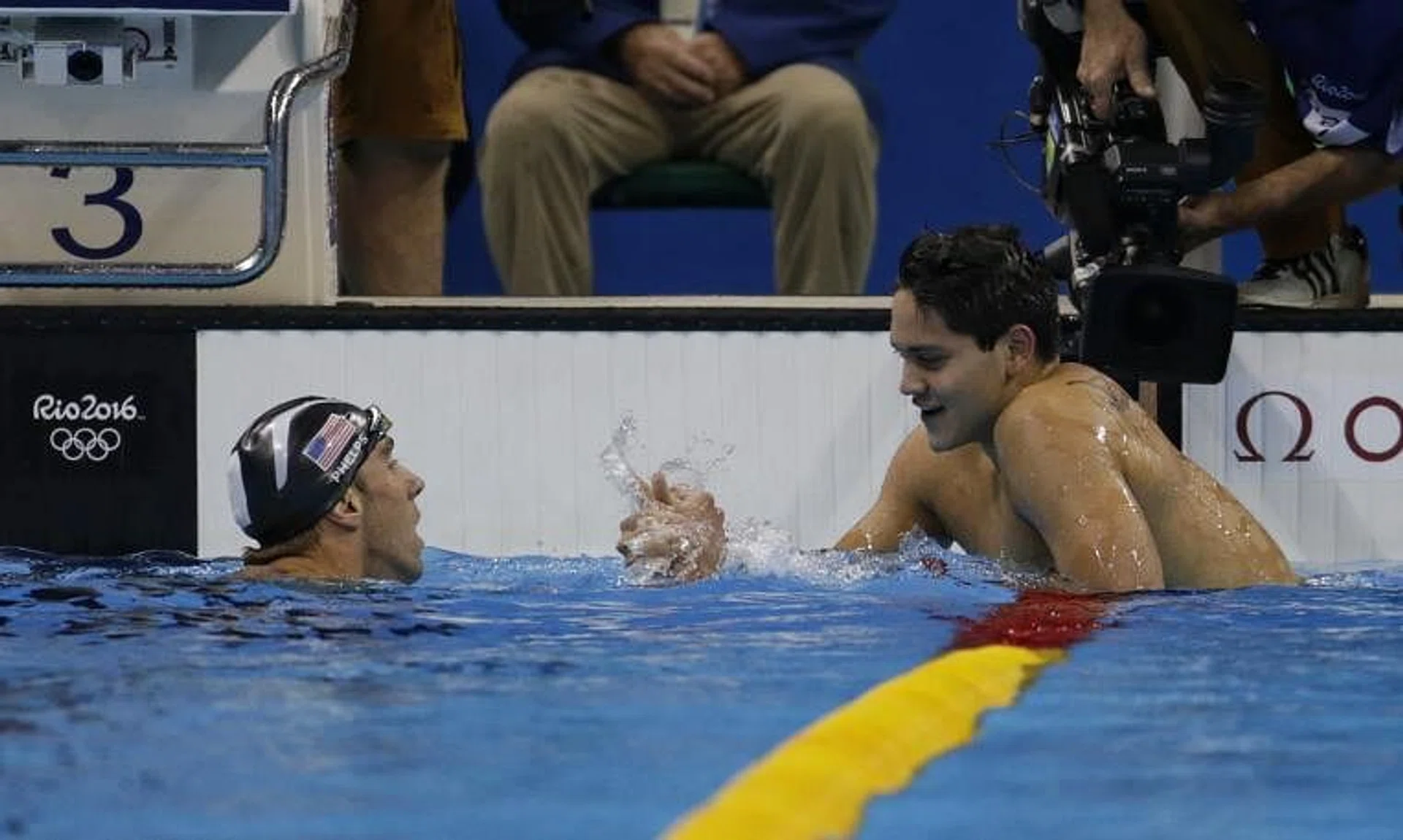 Joseph Schooling is congratulated by Michael Phelps after winning the 100m butterfly at the Rio 2016 Olympic Games.