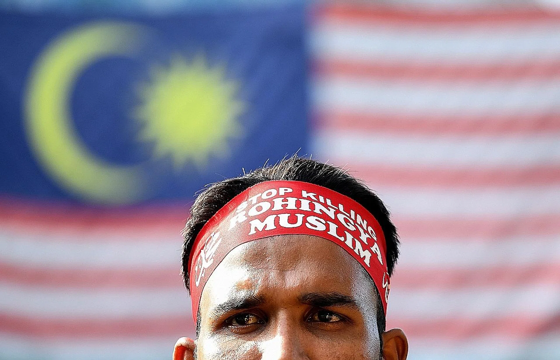 An ethnic Rohingya protesting in Kuala Lumpur recently against the persecution of Rohingya Muslims in Myanmar. 