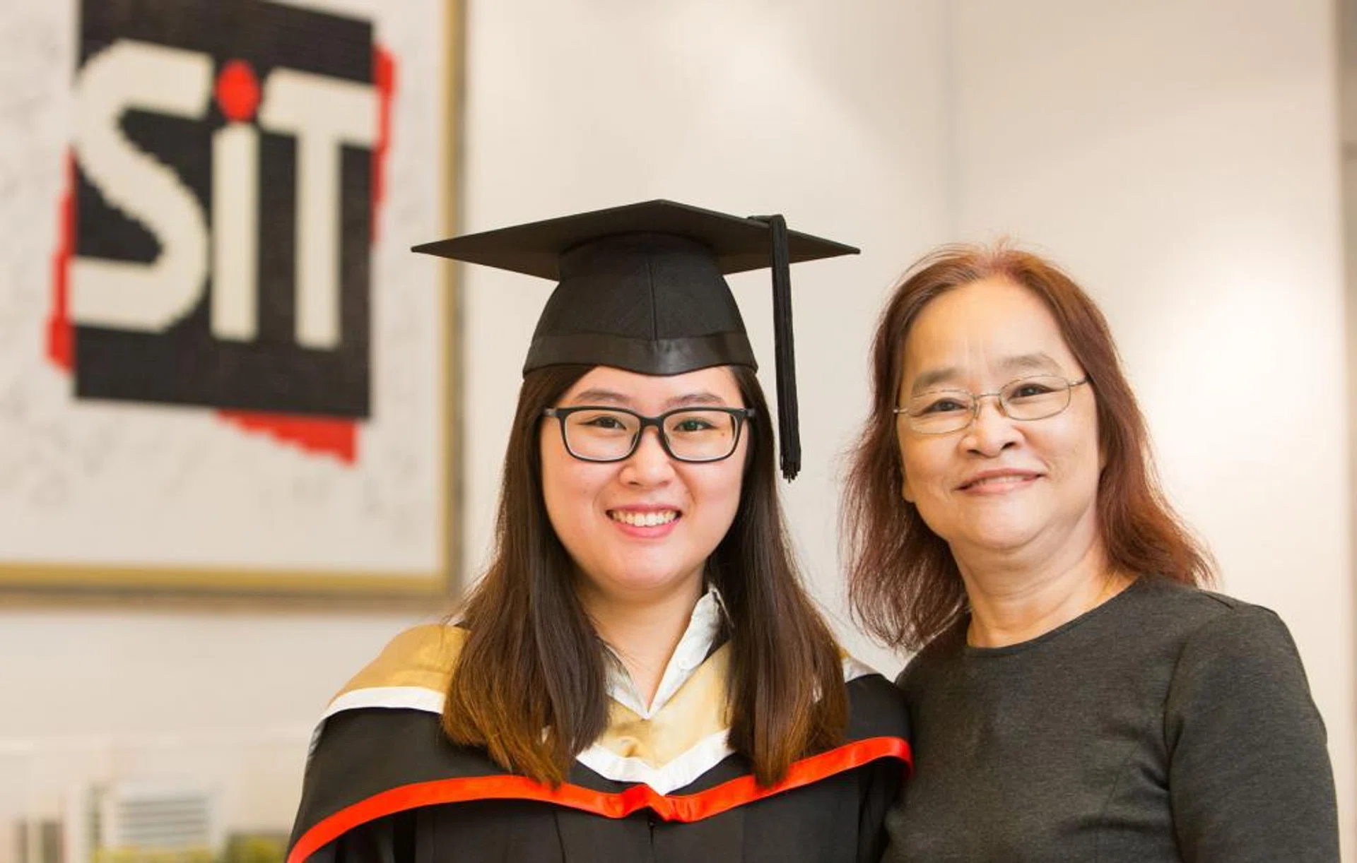 Miss Felicia Yeoh graduated yesterday, with her mum sharing her joy.  