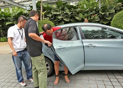 Lim Chu Kang murder suspect taken to alleged crime scene