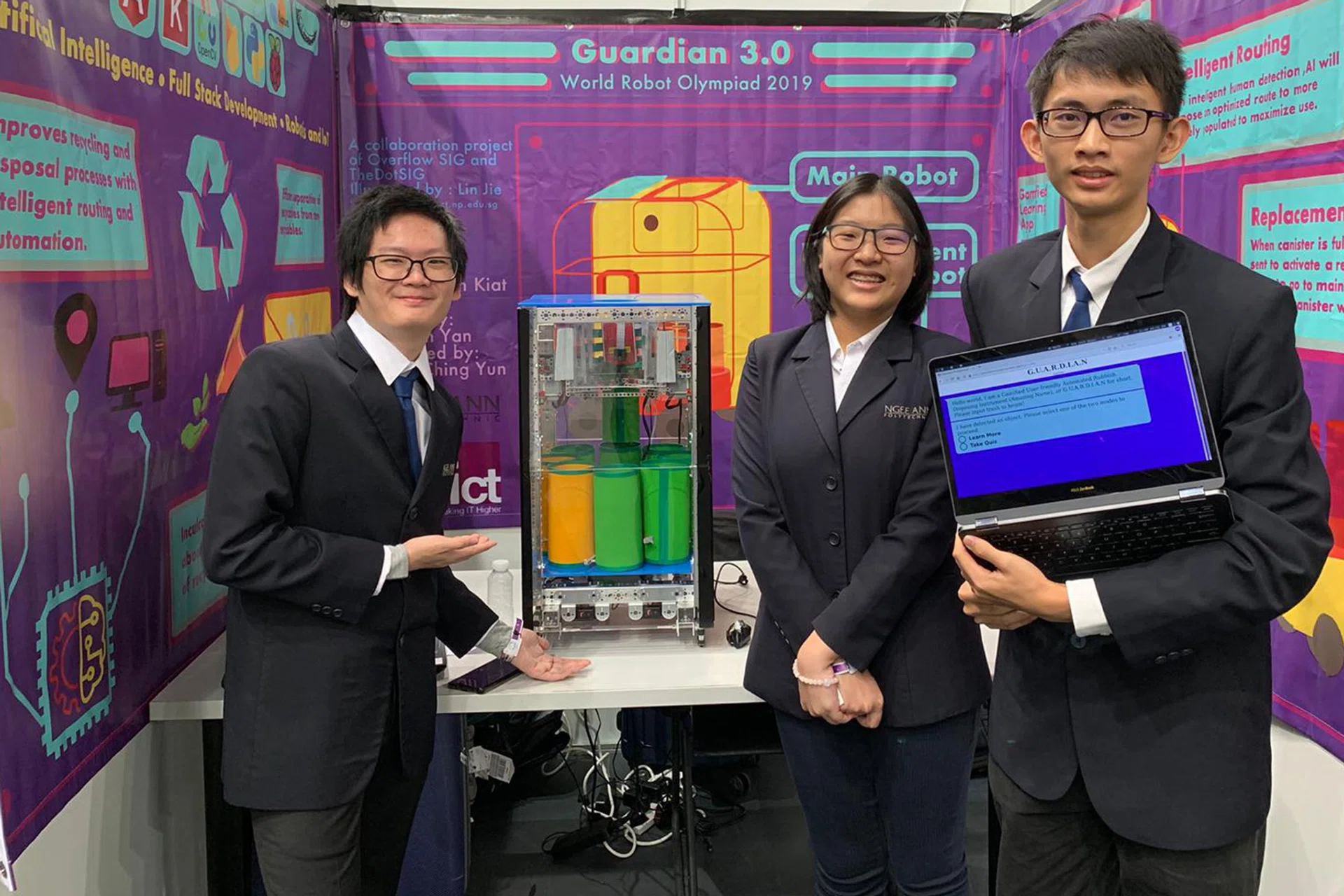 (From left) Mr Robin Yong, Ms Go Ruo Yan and Mr Jet Ong with their smart robot, which clinched for them the 11th place at the World Robot Olympiad last year. 