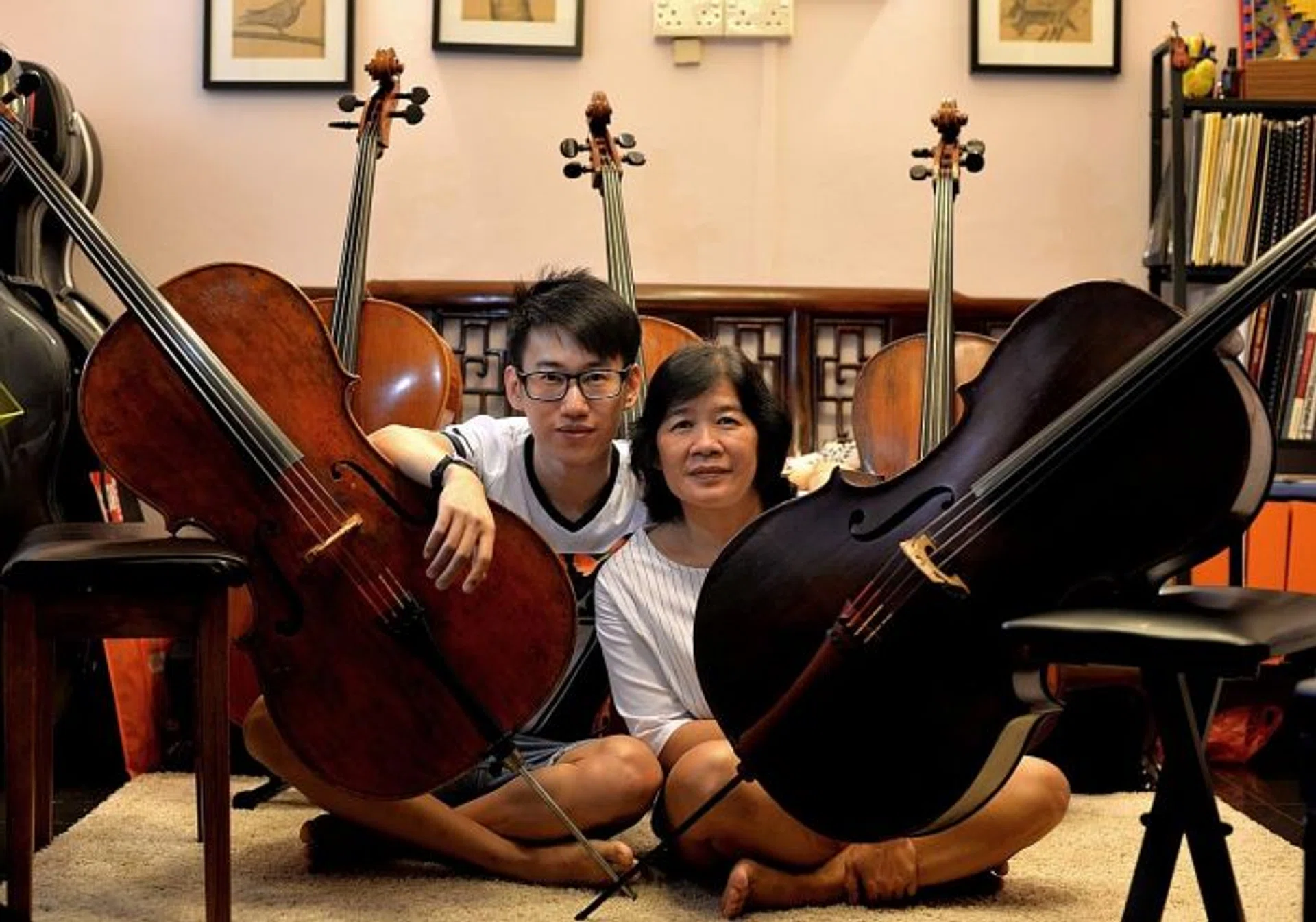 DUO: Madam Jazz Wong learnt how to pay the cello from her cello instructor son, Mr Hughes Chong.