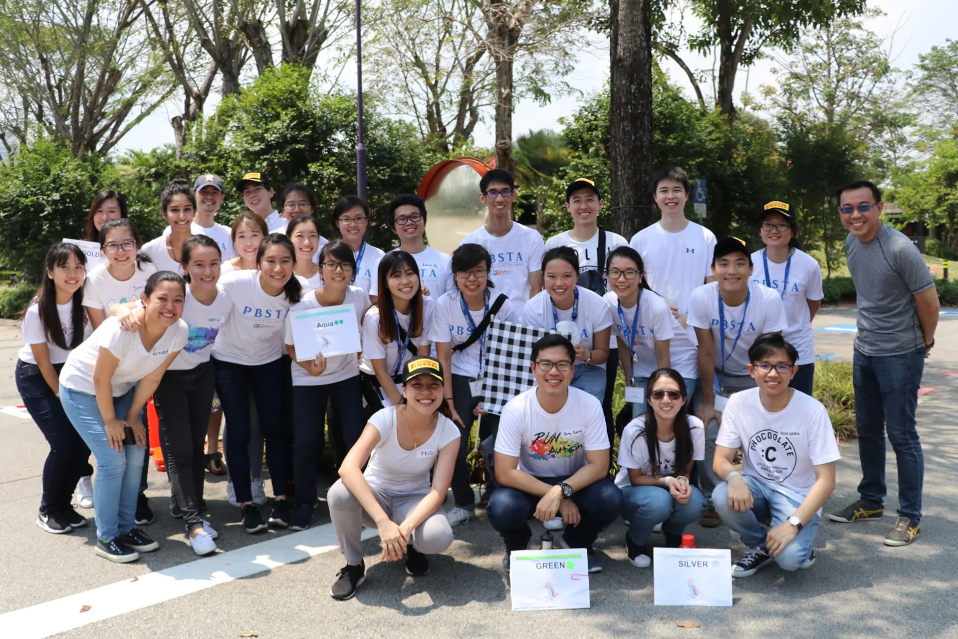 Dr David Low (far right in grey shirt) with students and volunteers who ran the event. 
