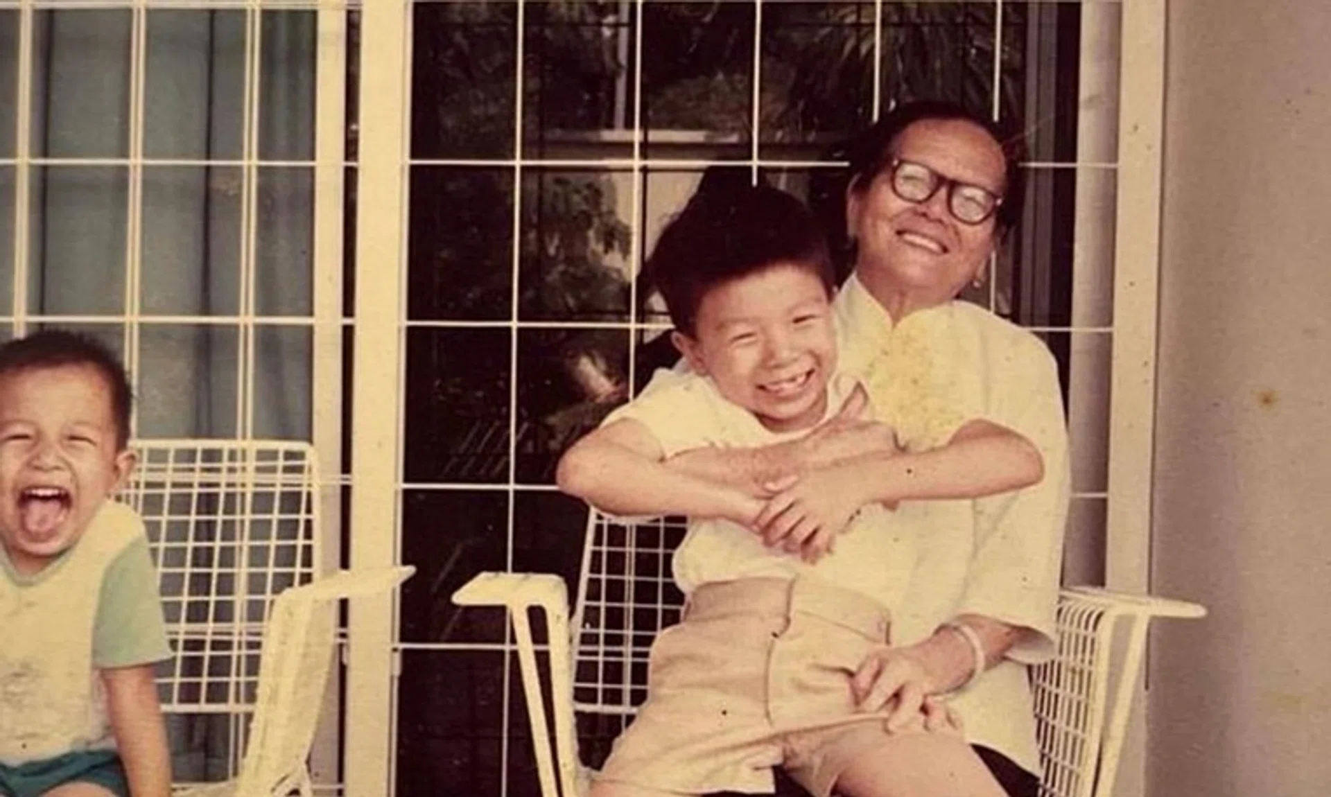Miss Loi Ooi Toh left Mr Lim (right) her life savings of close to $100,000 when she died. Next to them is Mr Lim's younger brother.