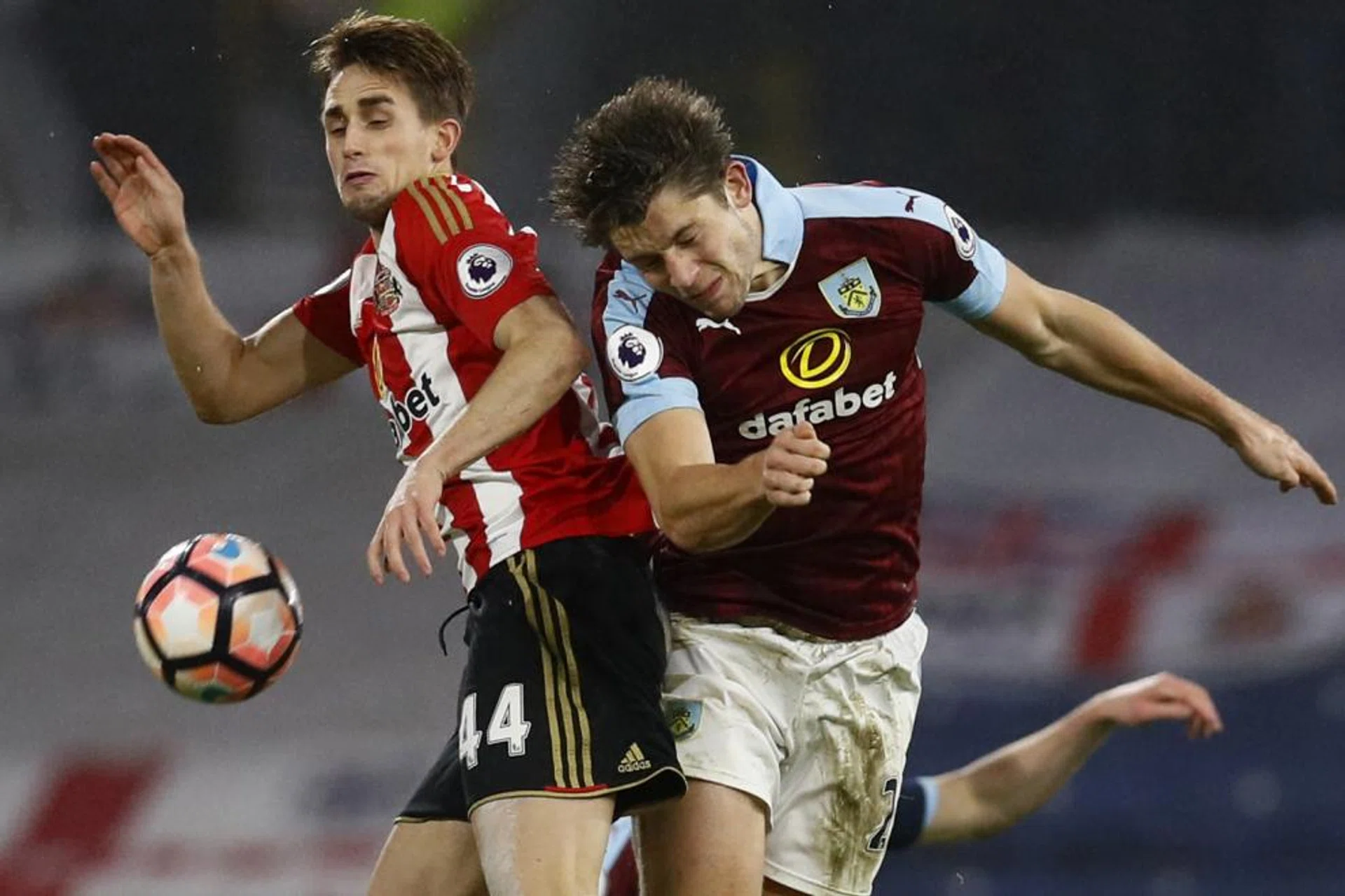 Burnley's James Tarkowski (right) and Sunderland's Adnan Januzaj fighting for the ball. Sunderland lost the FA Cup replay 2-0, which prompted their manager David Moyes  to emphasise the need to buy more players. 