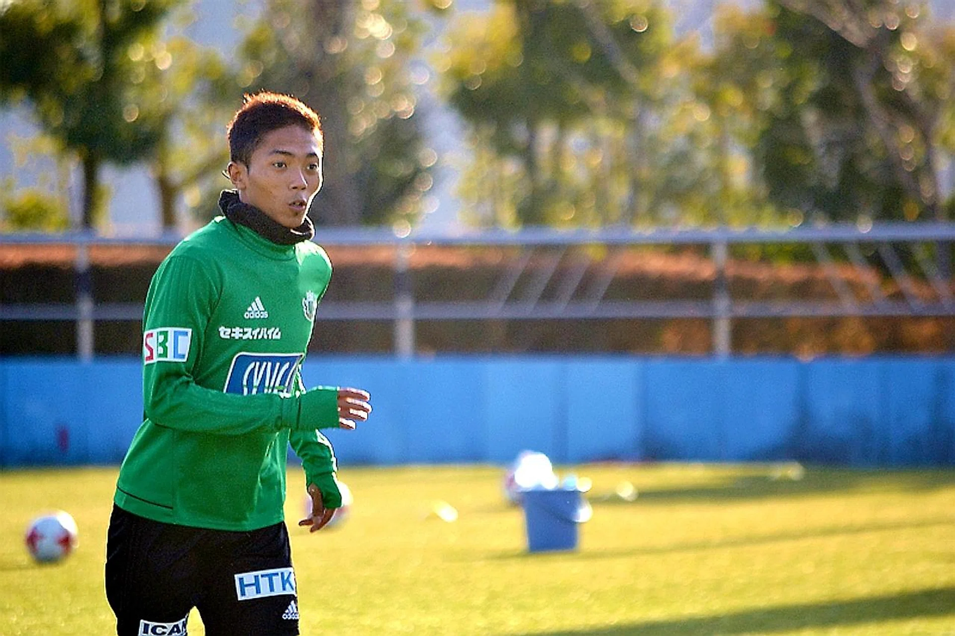 Shawal Anuar (above) and Gabriel Quak (with ball) going through their first training session yesterday.