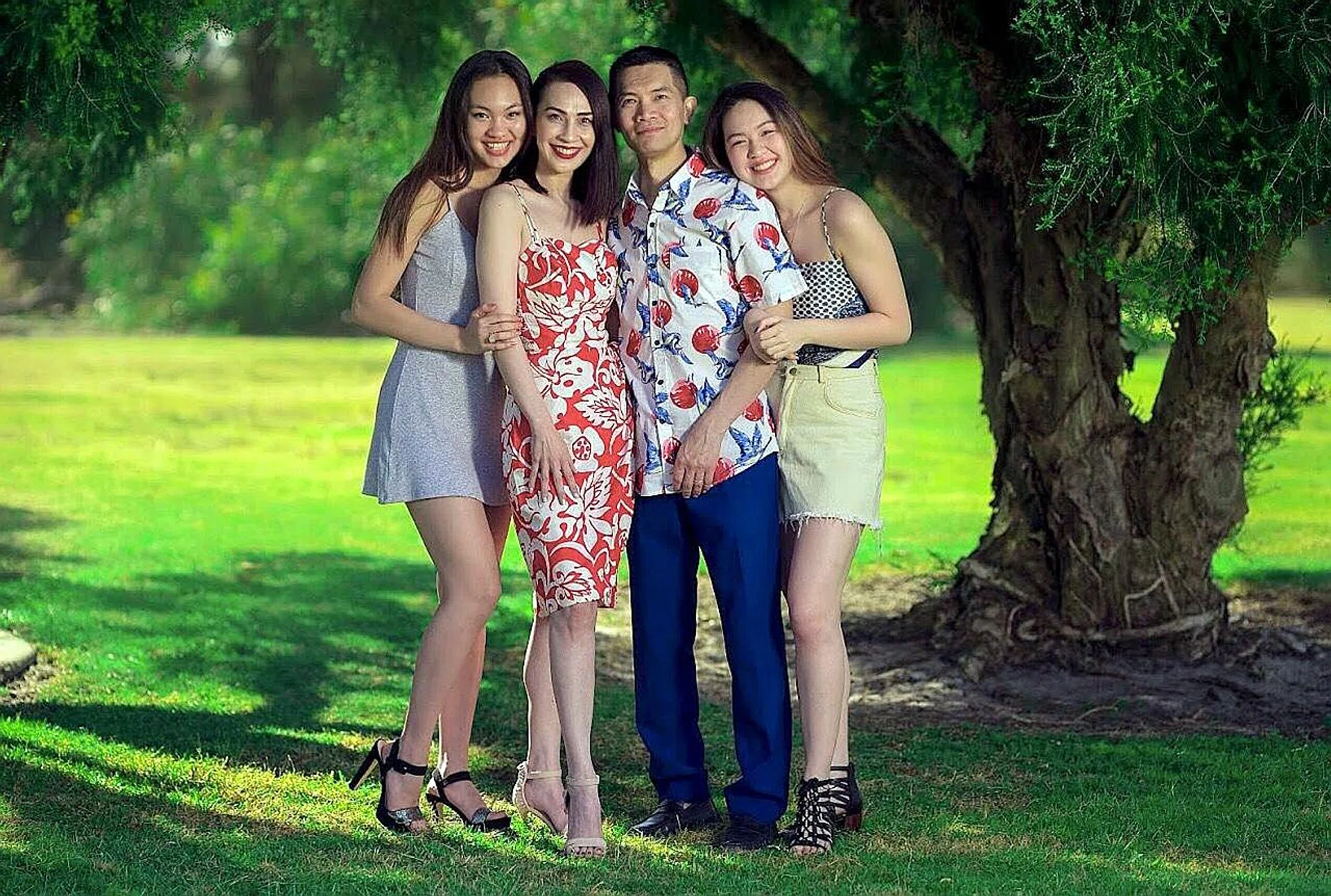 (From left) Miss Cate Lin Loo with her mother Angela Lee, her father Loo Ray Sun and her sister Loo May Tia.