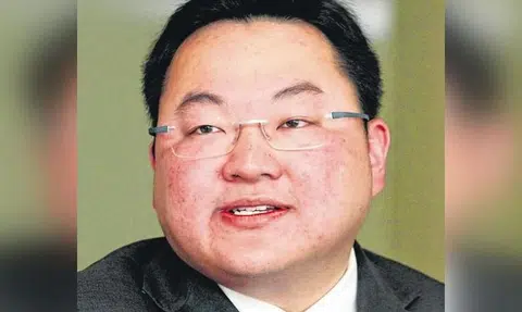 Malaysian fugitive Jho Low and father sentenced to jail for contempt of court