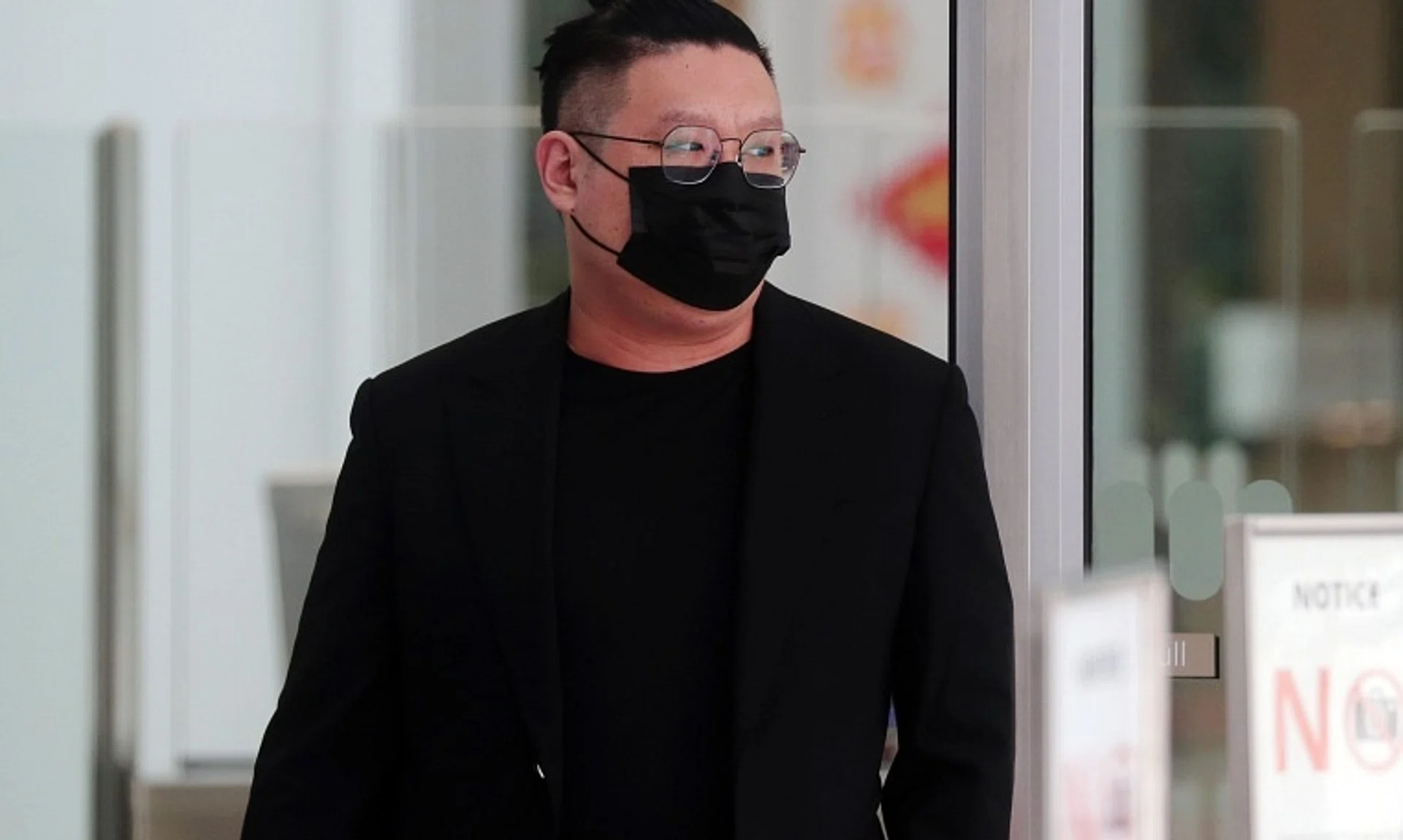 Ng Yu Zhi leaving the State Courts on Feb 14, 2022.