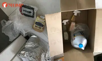 Bathroom cleaner spilled onto food items packed together in Redmart Delivery