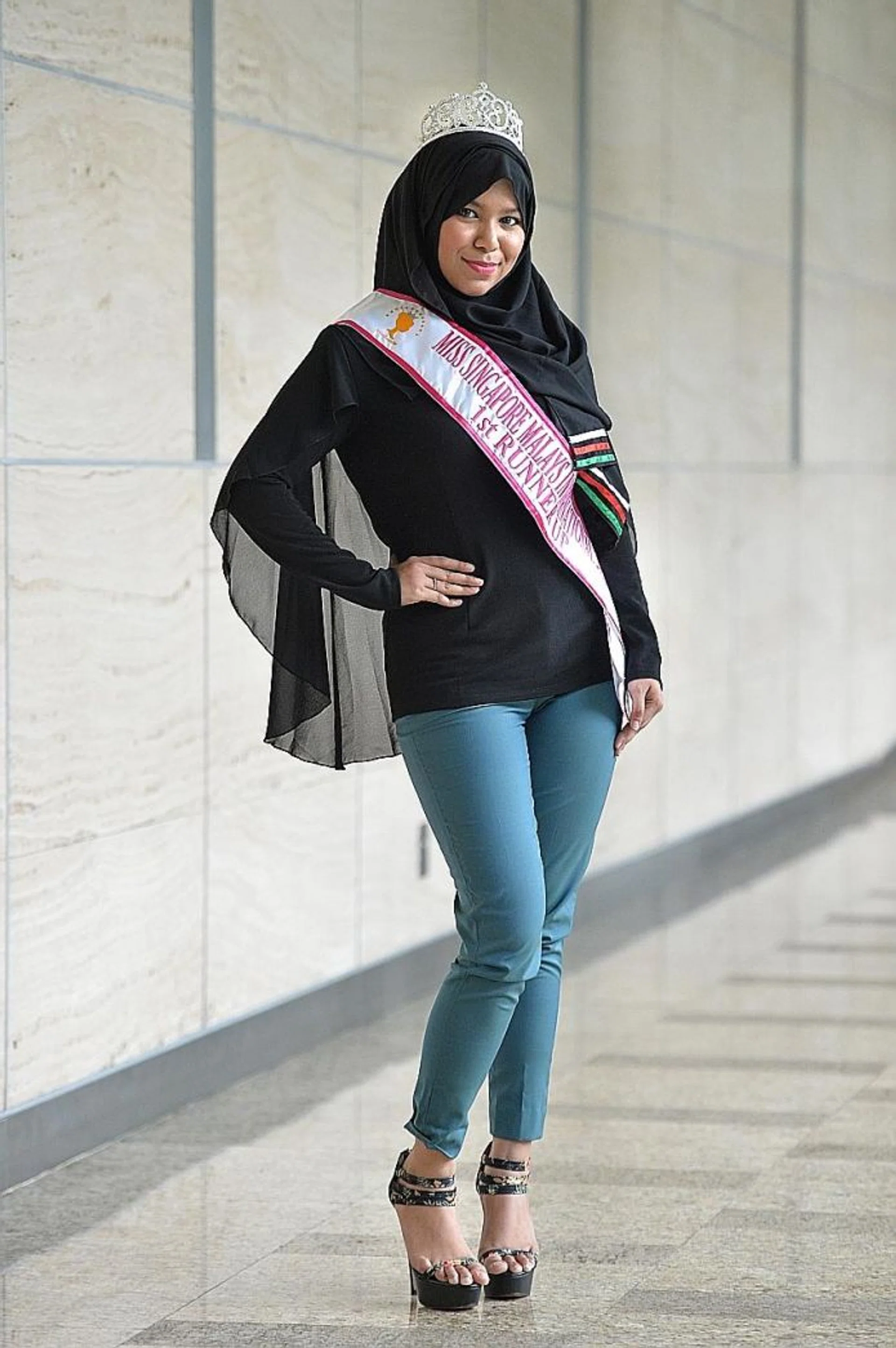 CONFIDENT: Miss Farelynn Syazwani Mohamed Farah, who used to be bullied in school for being overweight, was named runner-up in the inaugural Miss Singapore Malays International last month.