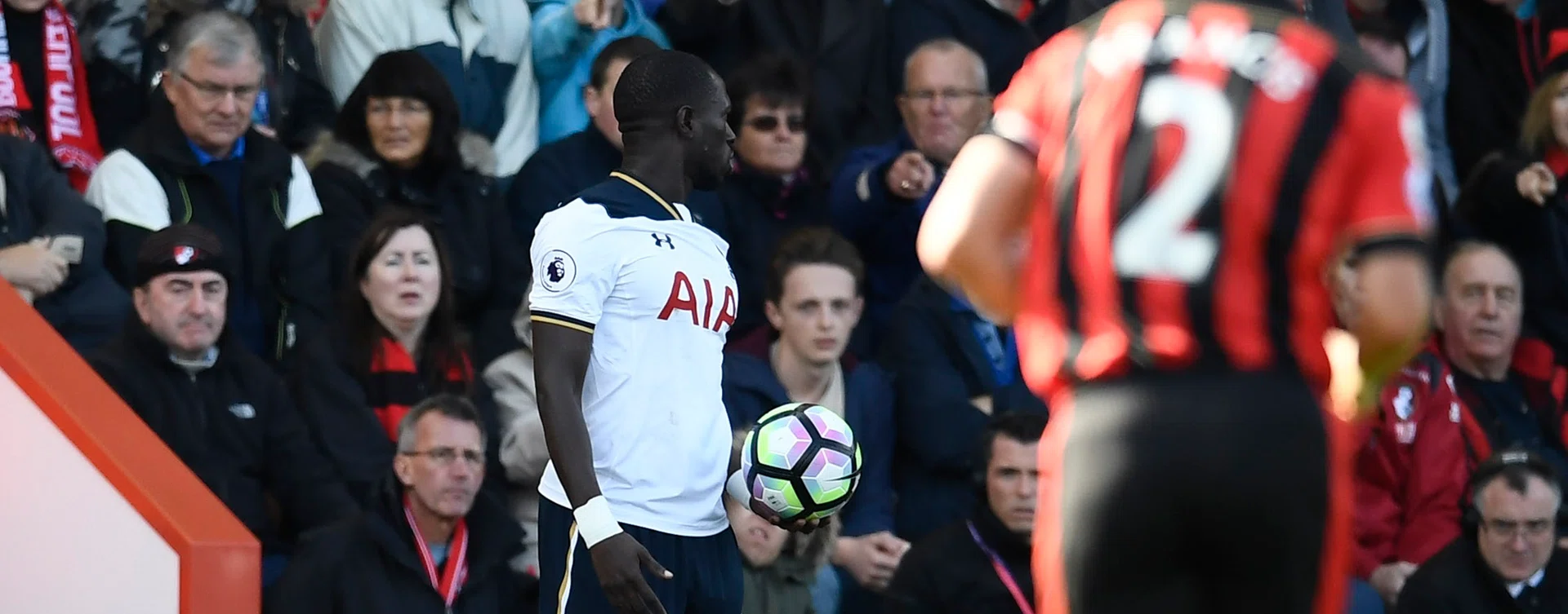 HARD MAN: Bournemouth's Harry Arter lying on the ground after clashing with Tottenham's Moussa Sissoko (left).