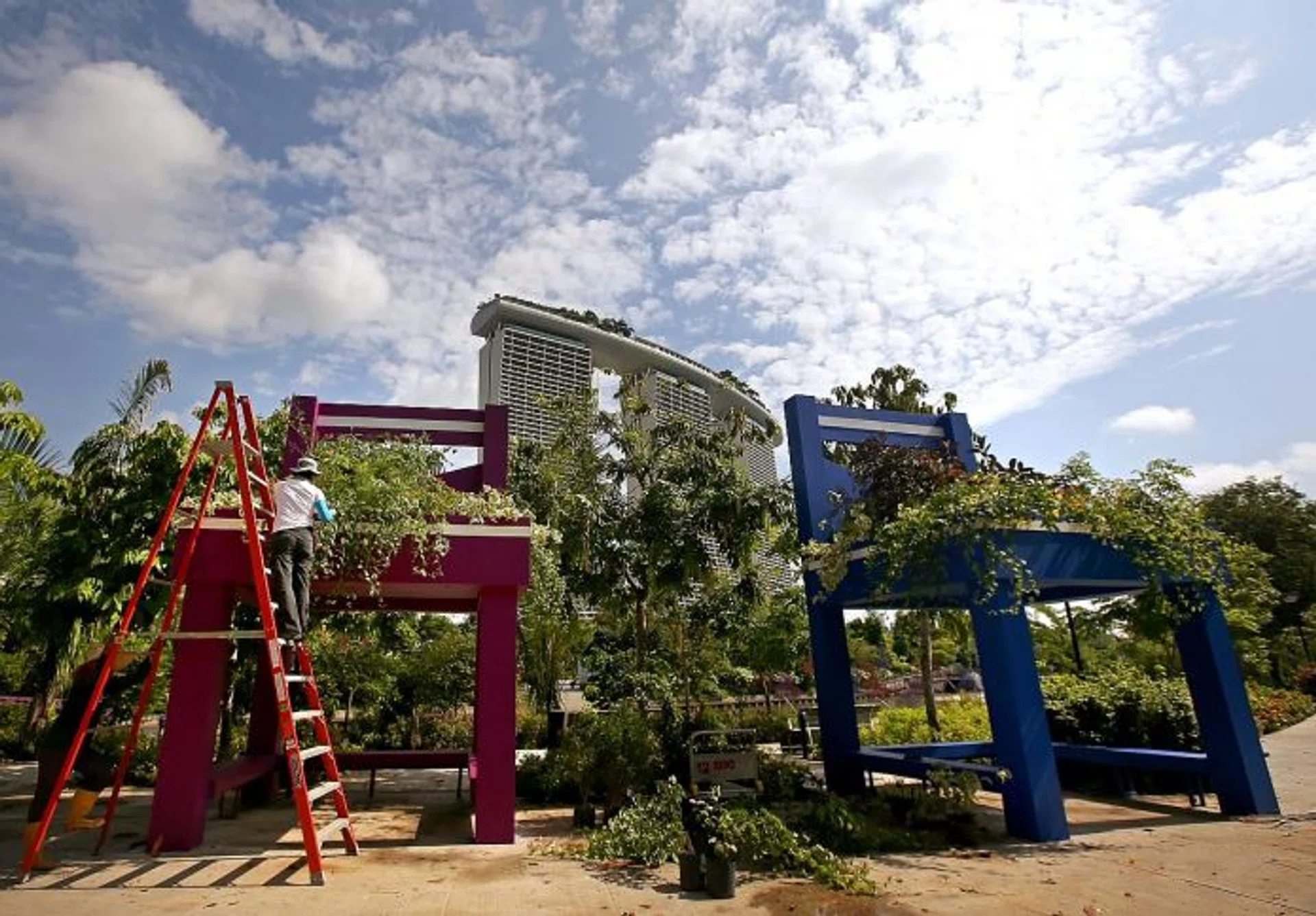 LARGER THAN LIFE: (Above) Standing as tall as two stories high, these "planted giant chairs" are a sight to behold. 