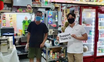 No charges against MP Louis Ng for placard without permit to support hawkers