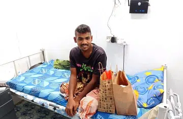 Worker loses leg, but there's still hope, even as expenses mount