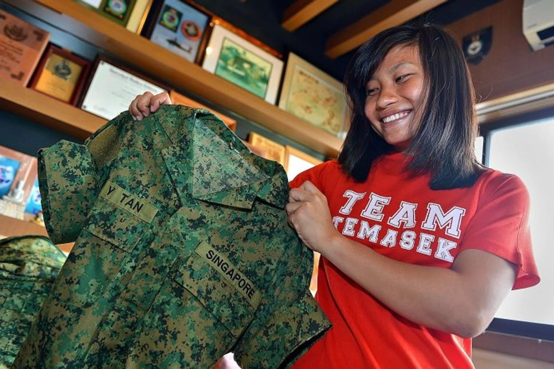 NAVY CALLING: Miss Andria Tan enlisted as a Navy Officer of the Republic of Singapore Navy after completing her Diploma in Psychology Studies at Temasek Polytechnic.
