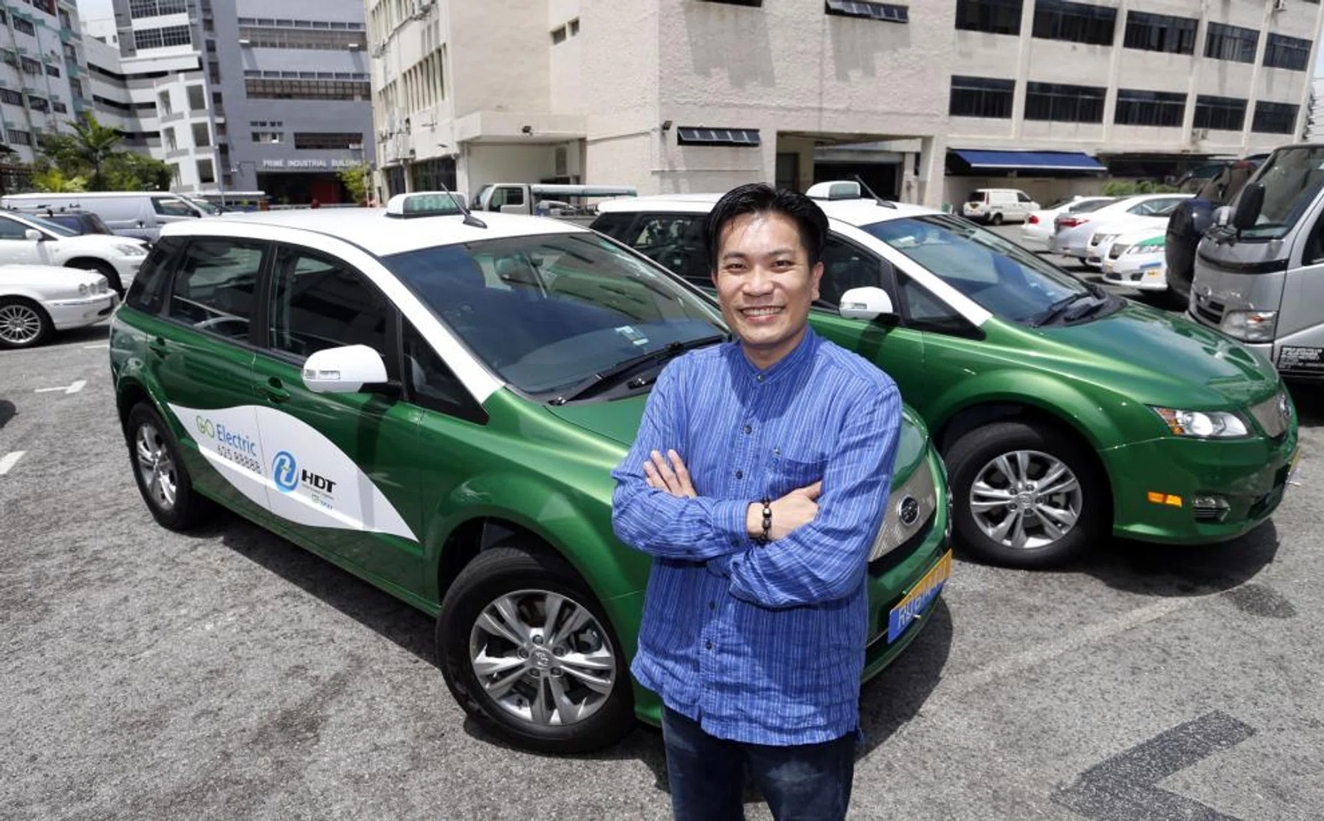 Mr James Ng, managing director of HDT Singapore Taxi, says its partnership with GrabTaxi will help its drivers get more jobs. 