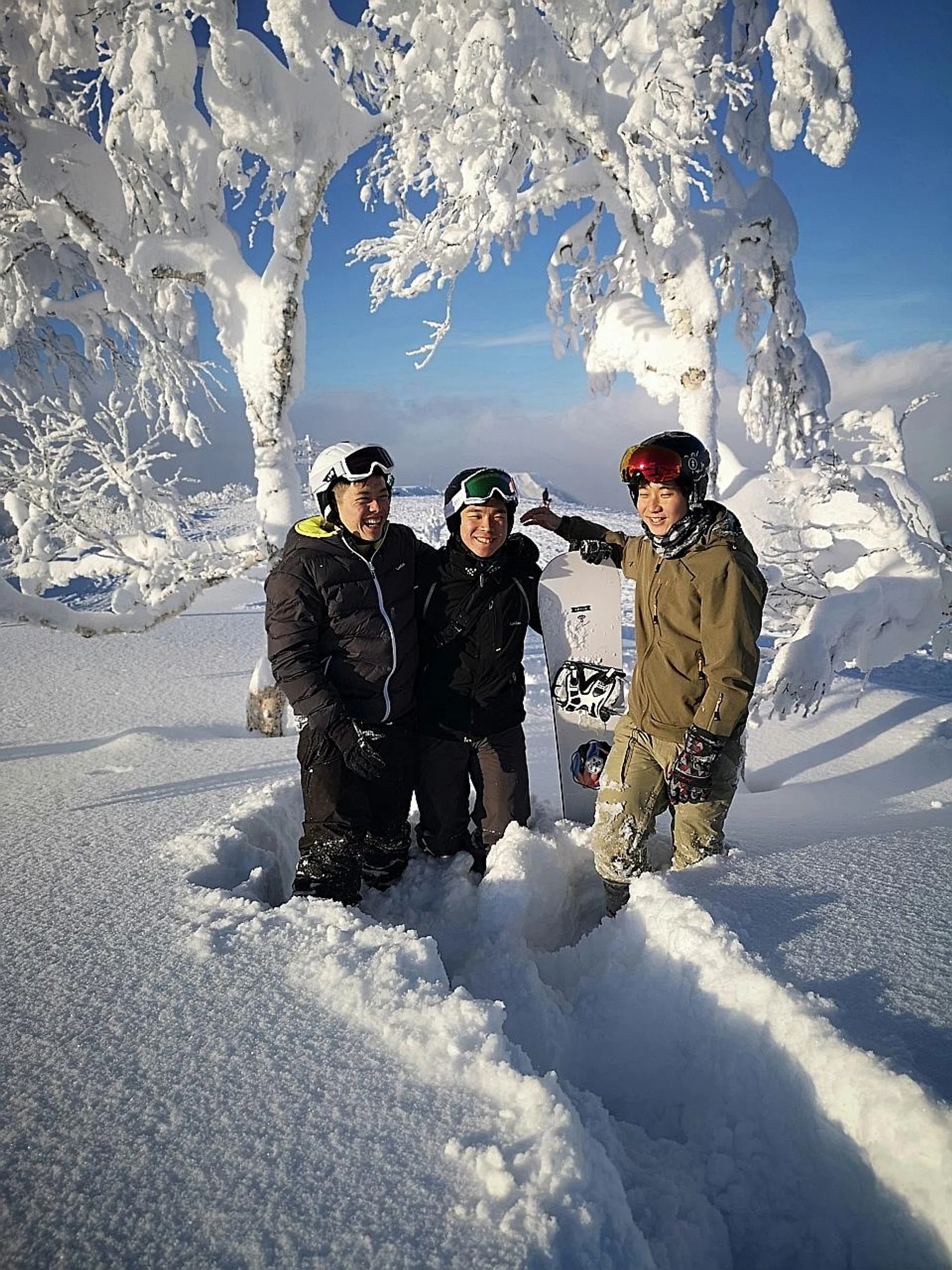Mr Ko Shu (far right) has been to Japan five times in the last five years and enjoys the winter sports in Hokkaido. 