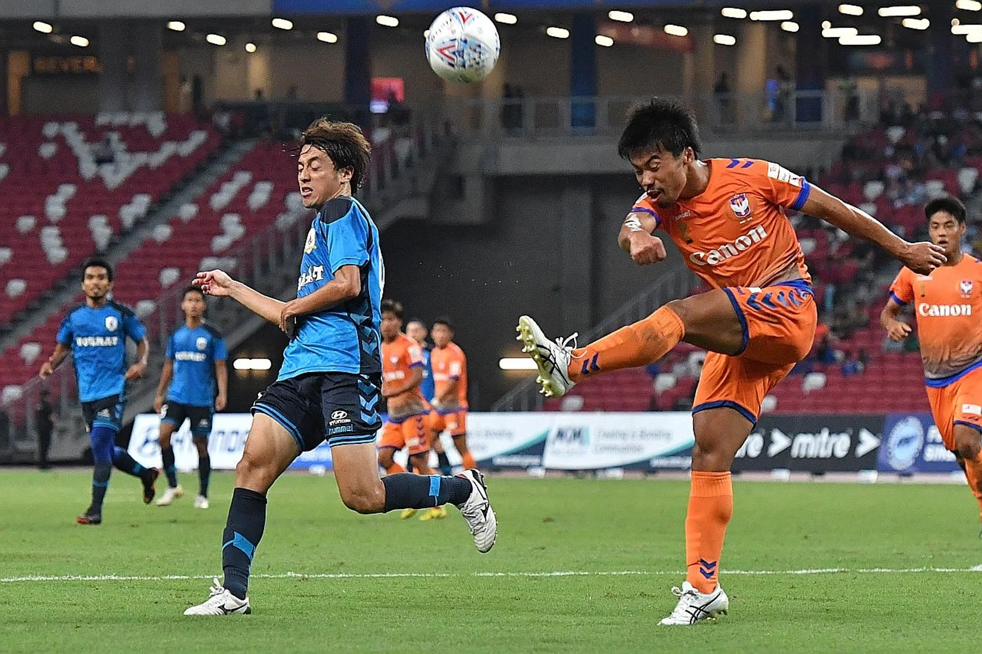 Albirex Niigata's Kenya Takahashi (right) clearing the ball during Saturday's Community Shield. 