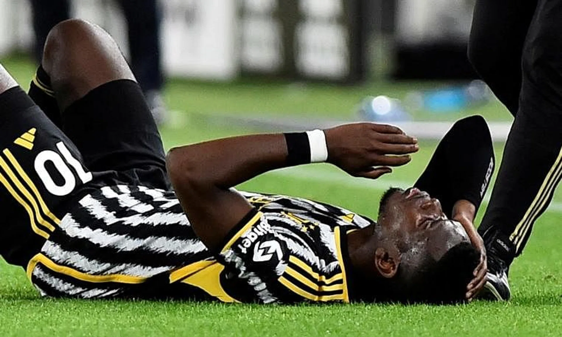 FILE PHOTO: Soccer Football - Serie A - Juventus v Cremonese - Allianz Stadium, Turin, Italy - May 14, 2023
Juventus' Paul Pogba down injured REUTERS/Massimo Pinca/File Photo