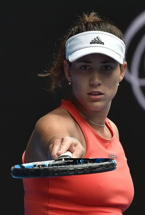 Muguruza made to sweat against Belgian veteran Flipkens