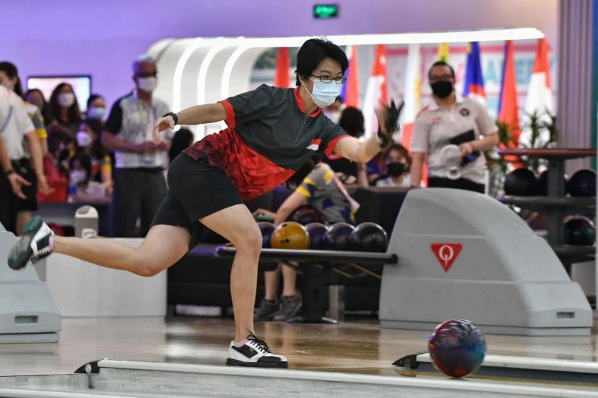 Cherie Tan scored 1,442 pinfalls to top the field of 12 and clinch the gold. 