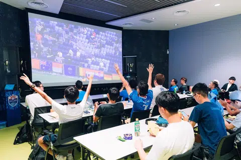 A group of around 80 Sailors supporters gathering at the club's Mattar Road training centre for a watch party.