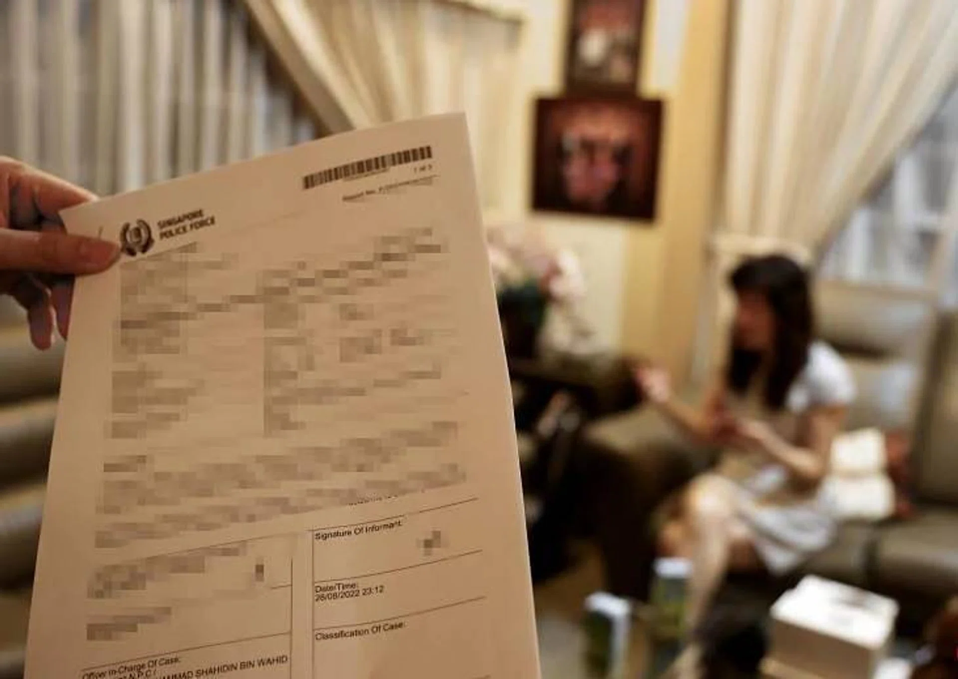 A police report filed by Huang, whose maid had borrowed from loan sharks.