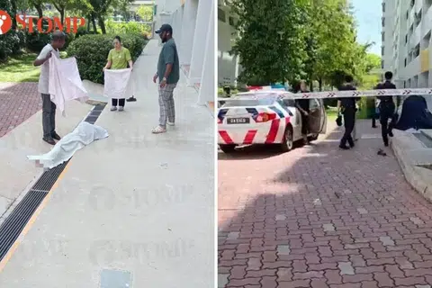 Residents cover body of 66-year-old woman found dead at foot of Toa Payoh block