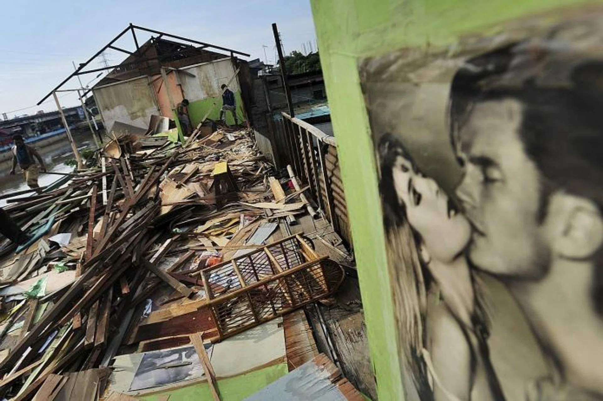 RUINS: A building housing a cafe in Kalijodo red-light district being demolished.