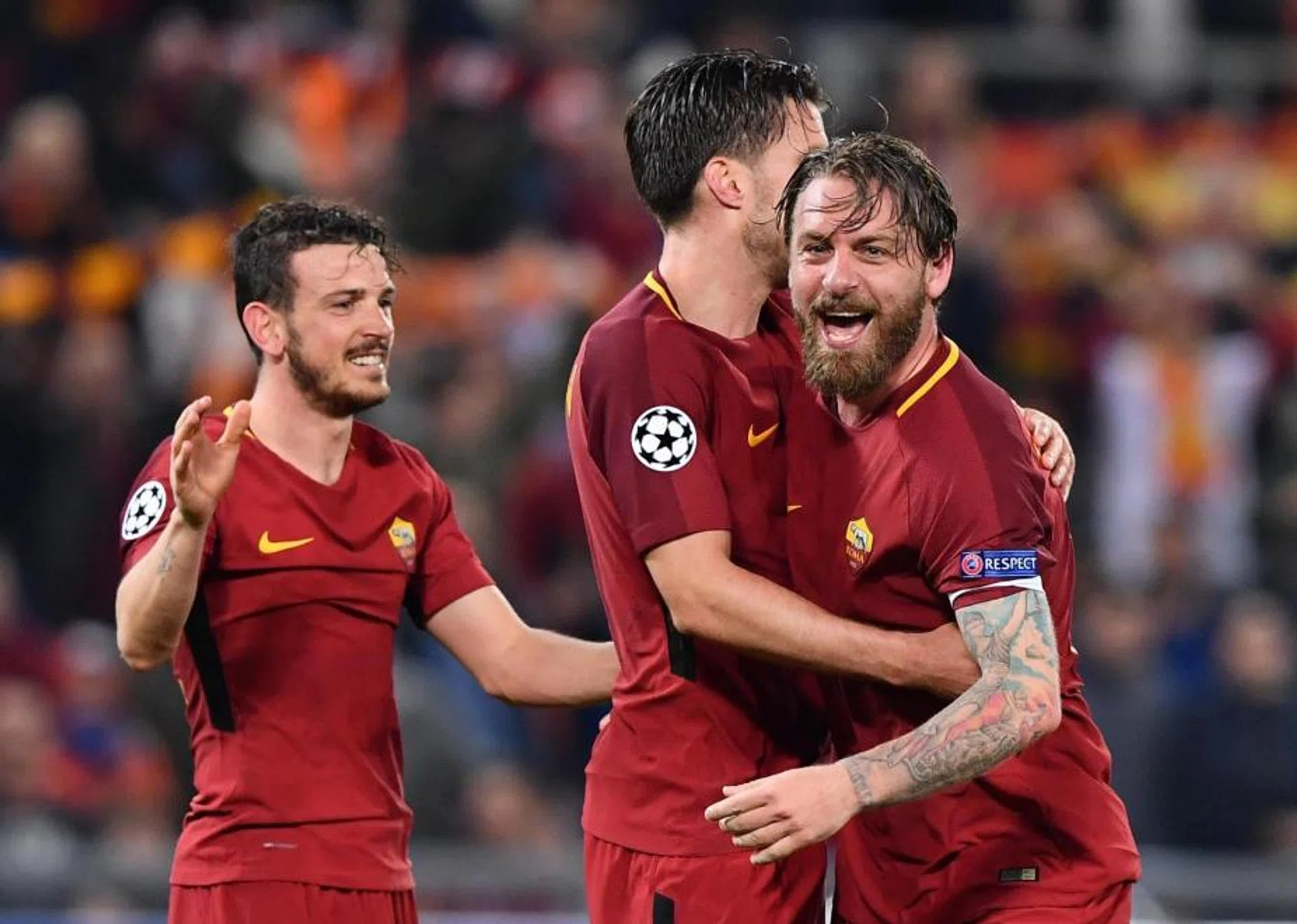 (From left) AS Roma's Alessandro Florenzi, Kevin Strootman and Daniele de Rossi celebrating their 3-0 win over Barcelona in the Champions League quarter-final, second leg.