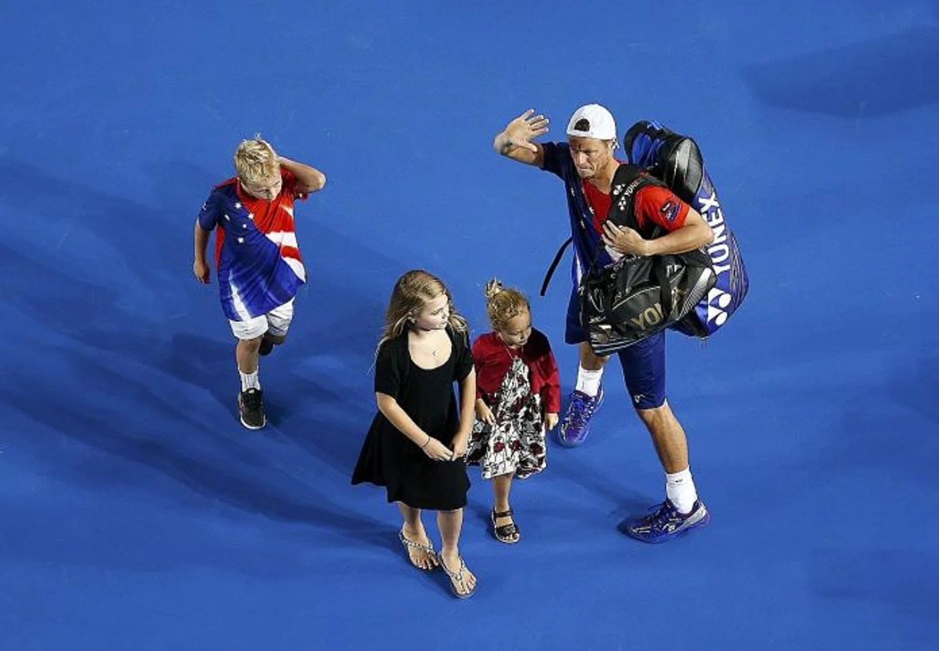 "I’ve had so much success in big matches on this court and I feel fortunate to finish here. It’s the perfect place to finish." - Lleyton Hewitt (above, with his children)