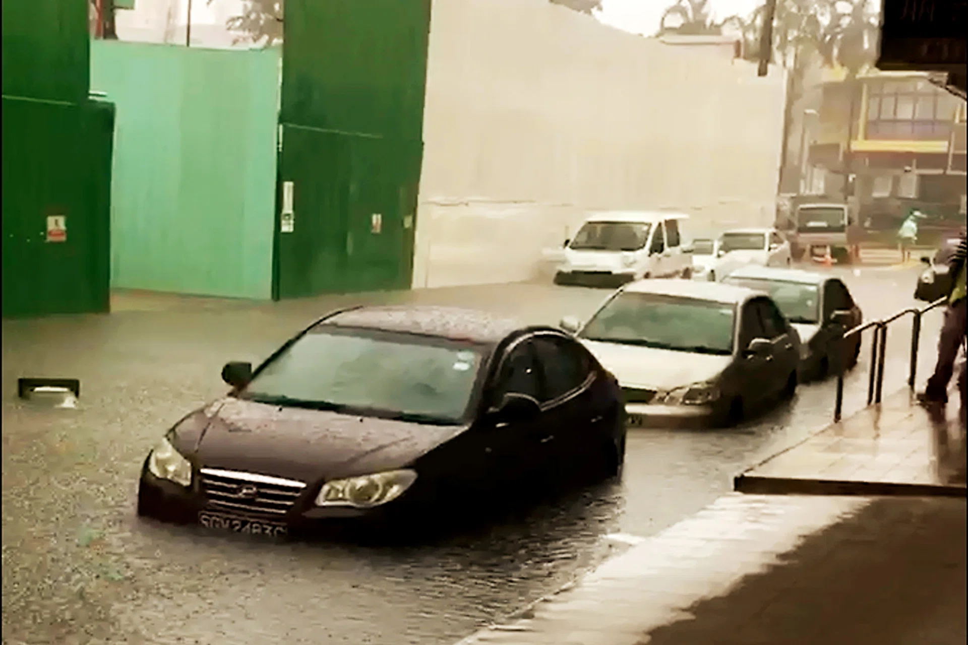 The flood along Upper Thomson yesterday. 