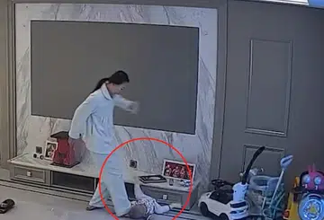 Quick-thinking mum in China cushions baby's fall with her foot