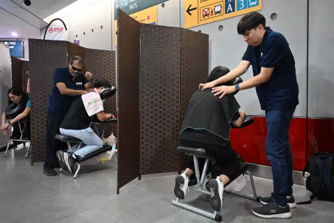 SMRT rolls out free 10-minute shoulder massage at three MRT stations