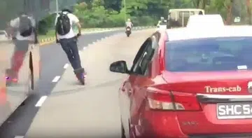 E-scooter rider dices with death by overtaking bus