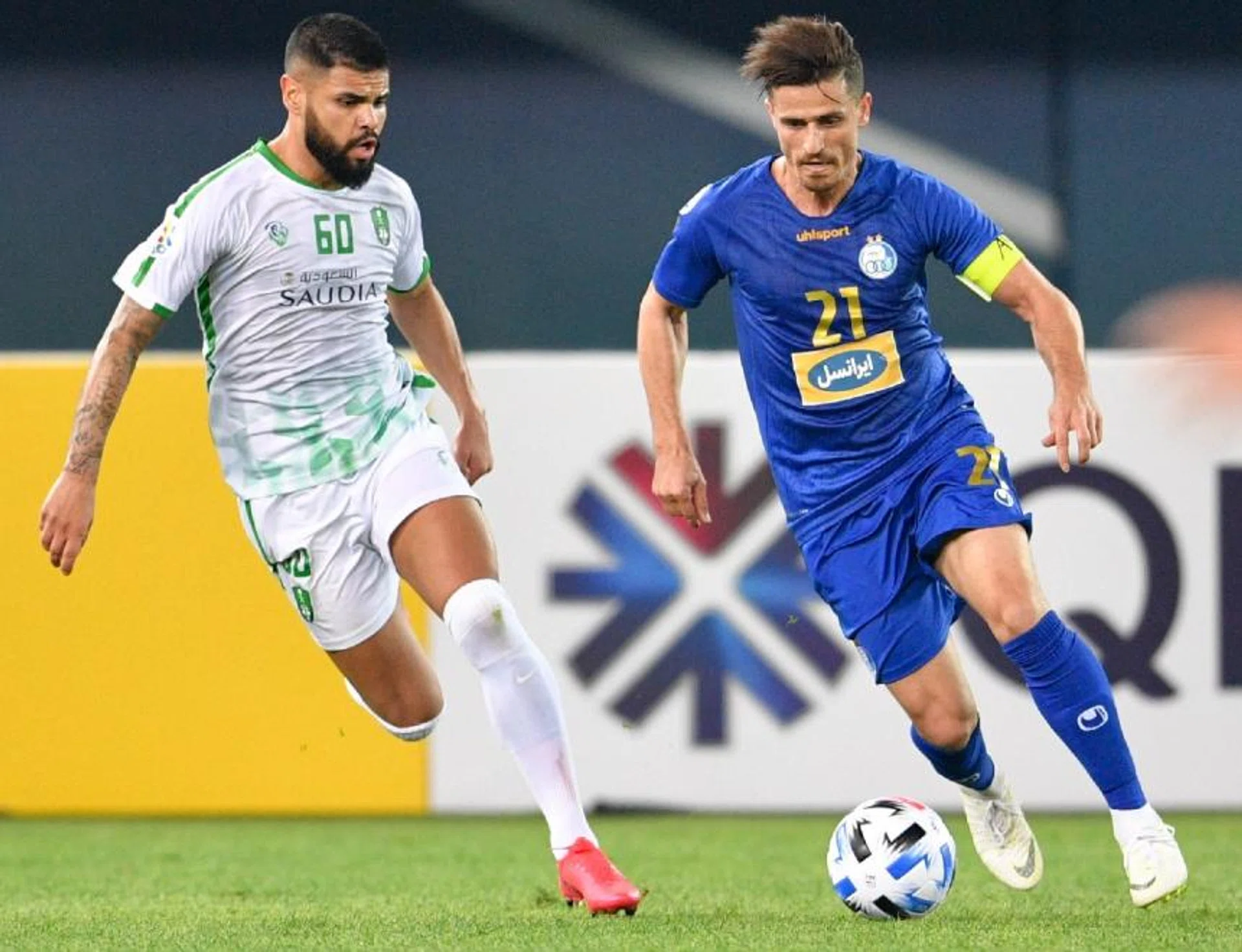 On Thursday, Asian Champions League matches featuring Iranian clubs, such as Ali Dashti's Esteghlal (in blue), were postponed as Iran became the latest nation to be severely affected by the coronavirus epidemic.