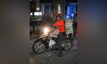What keeps one newspaper vendor going despite increasingly tough times