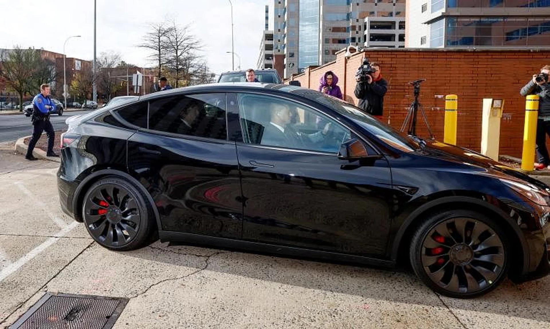 Mr Elon Musk arrives for a trial about his Tesla pay package at the Delaware Court of Chancery in Wilmington, US. 