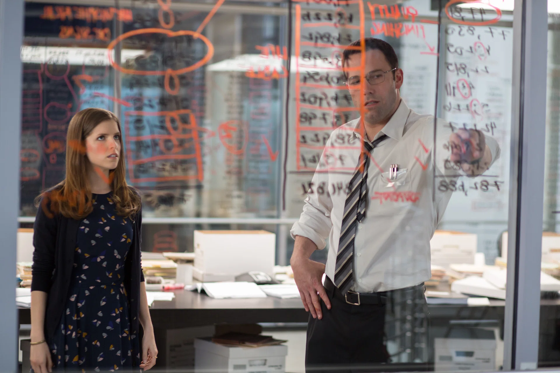 Anna Kendrick (left) and Ben Affleck (right) in The Accountant