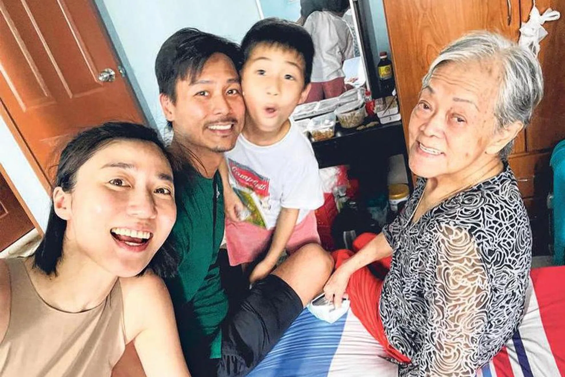 Andie Chen (second from the left) and his grandmother (right) in a photo taken before her death.