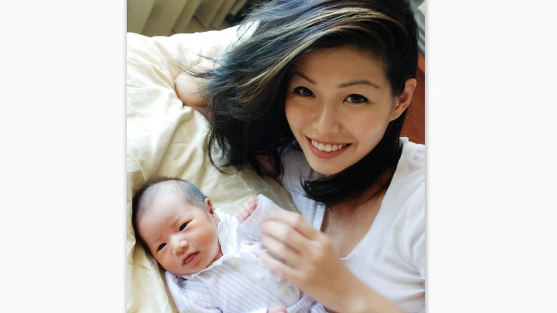 Sandy Chua, the Miss Singapore Universe 2004 pageant winner, is a full-time mother. 