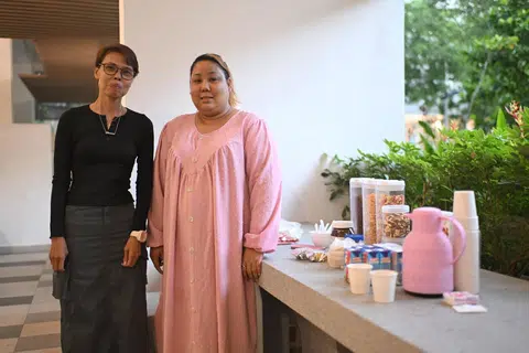 Ms Lydia Susiyanti Sukarbi (right) and Ms Halinah Yatim with the items they have prepared for breakfast.