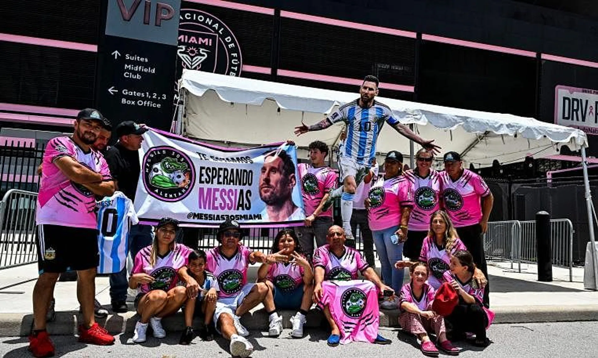 Fans of Argentina's Lionel Messi wait for his arrival at the DRV PNK Stadium in Fort Lauderdale.