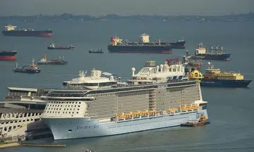 Passenger who fell from cruise ship has died, says son; search continues