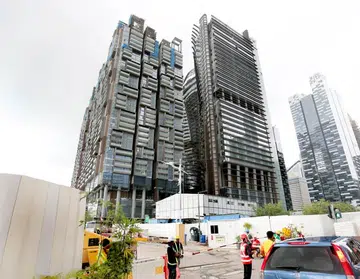 Worker falls nearly 20 storeys to death, hits another on 3rd storey