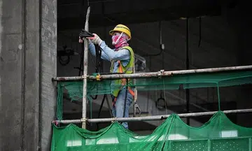 Worker dies after falling 9.5m to factory floor